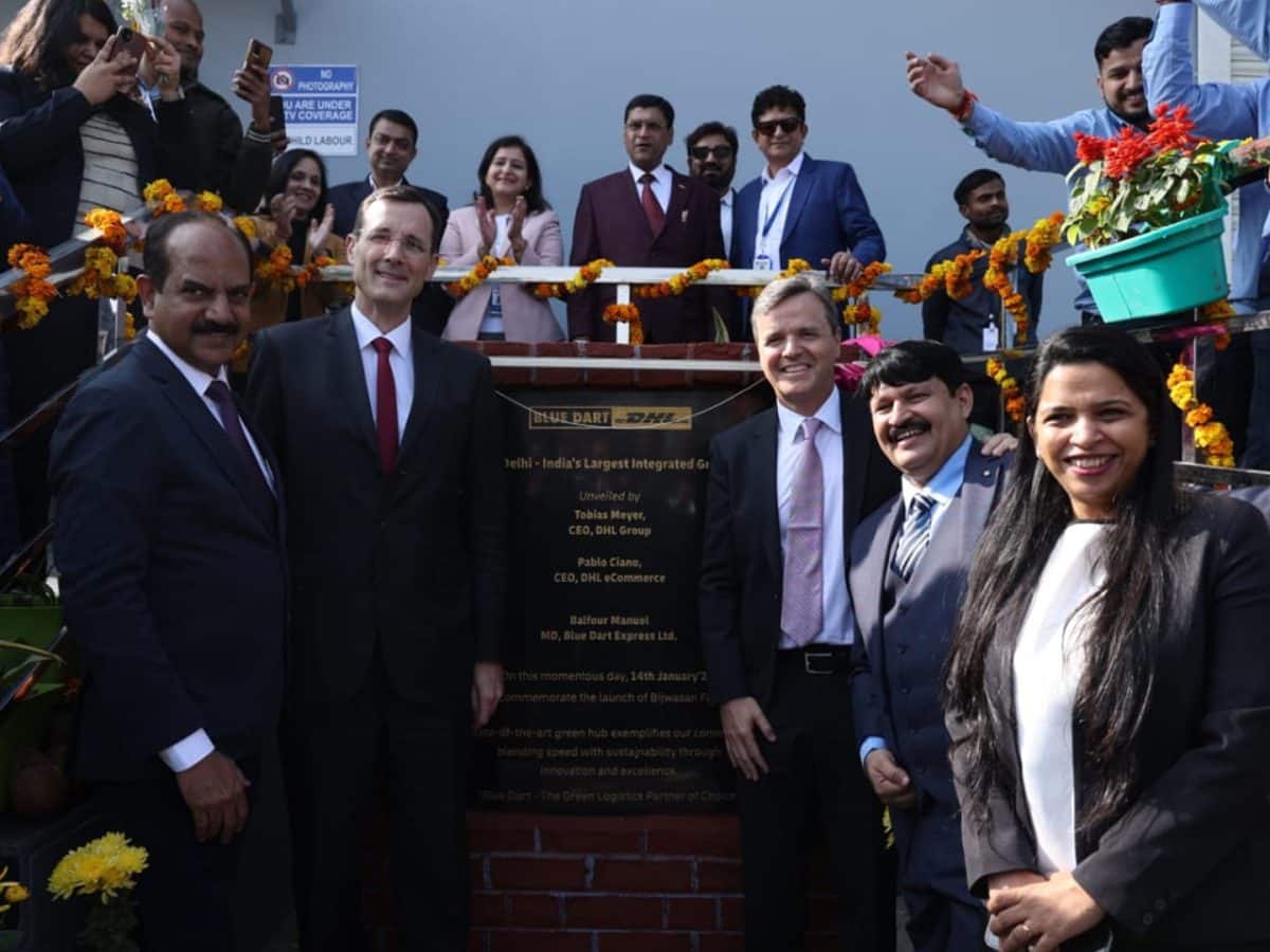 Balfour Manuel Managing Director Blue Dart with team
