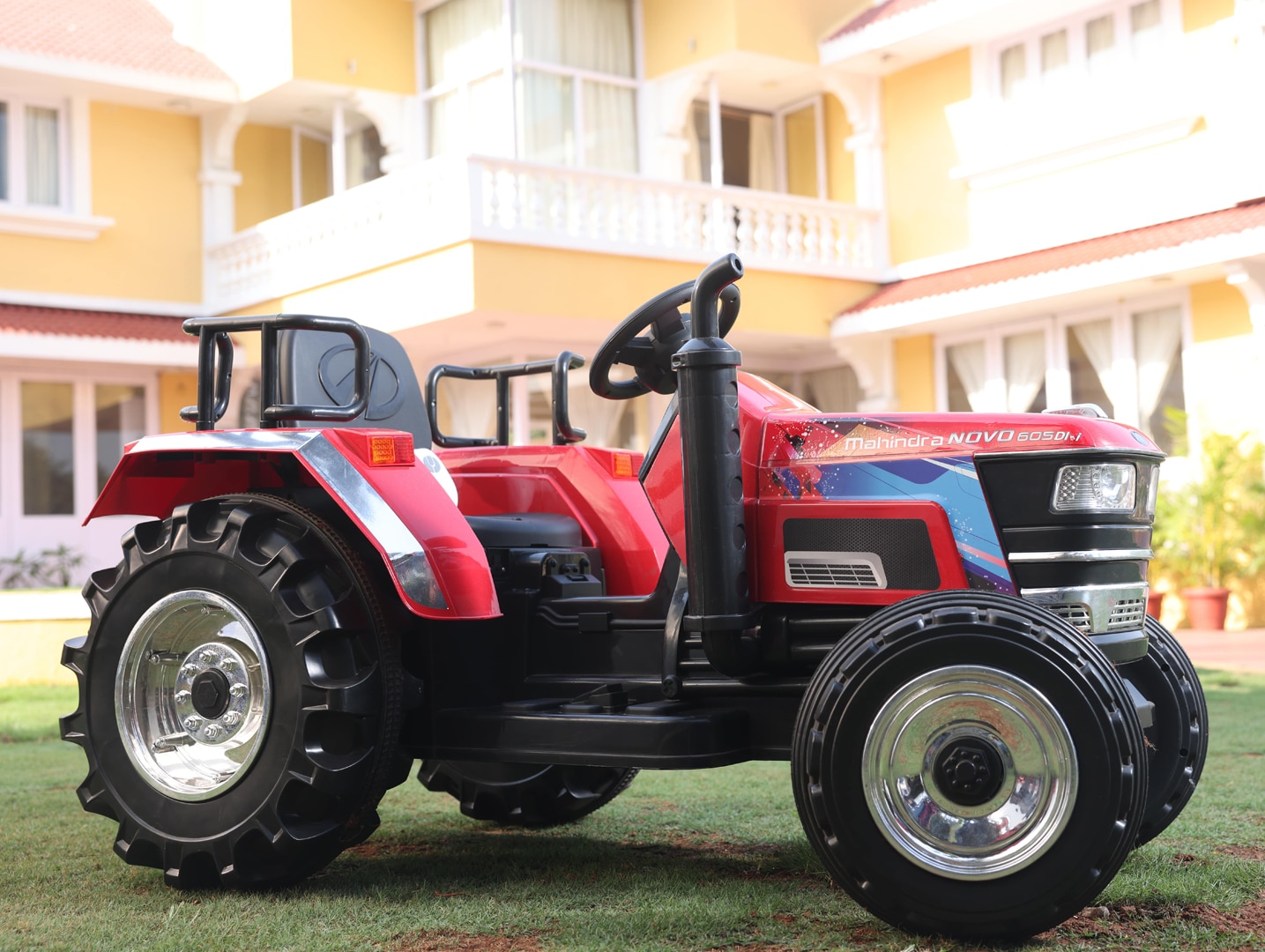 Available on Mahindra’s website and dealerships, with OJA toy model, t-shirts, bags, and merchandise.